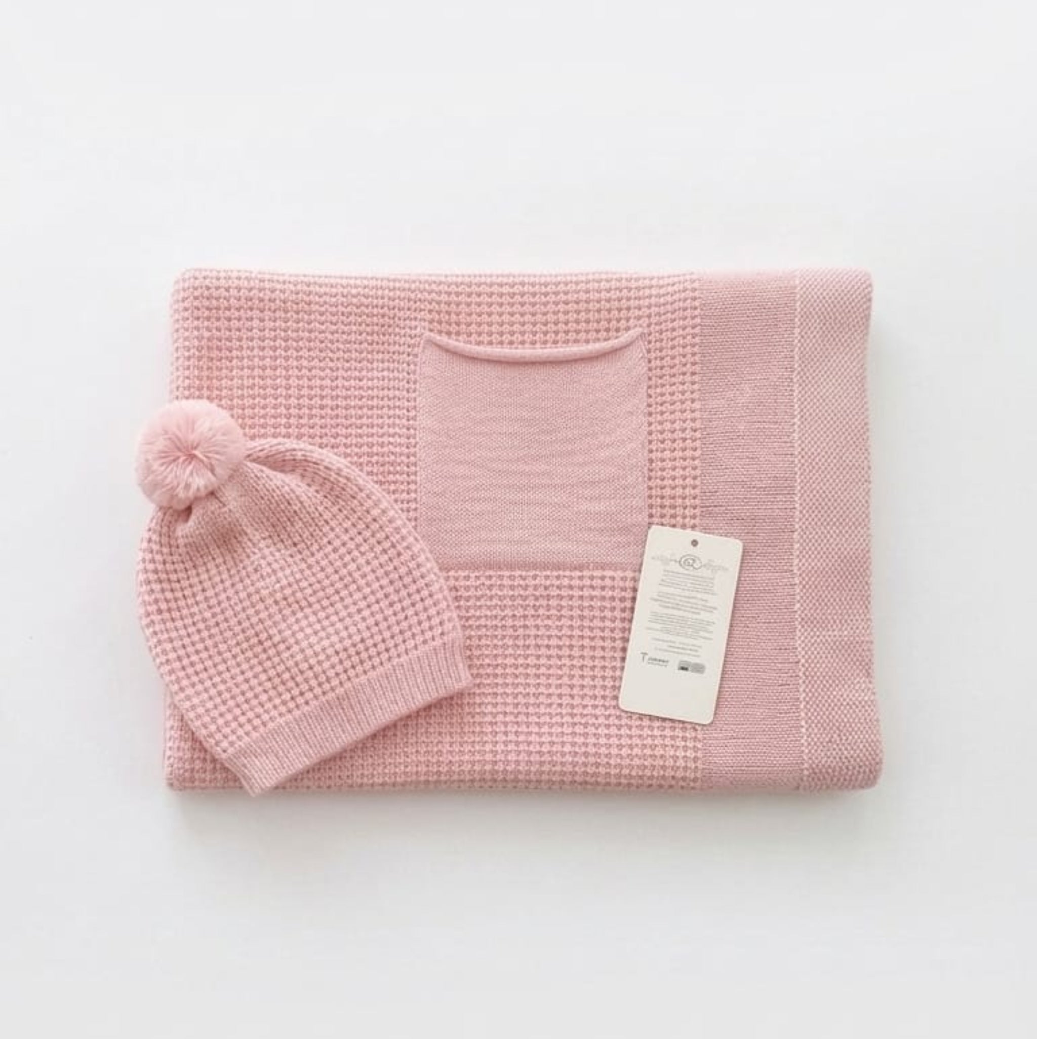 Single-layer knit blanket with a beanie and pocket